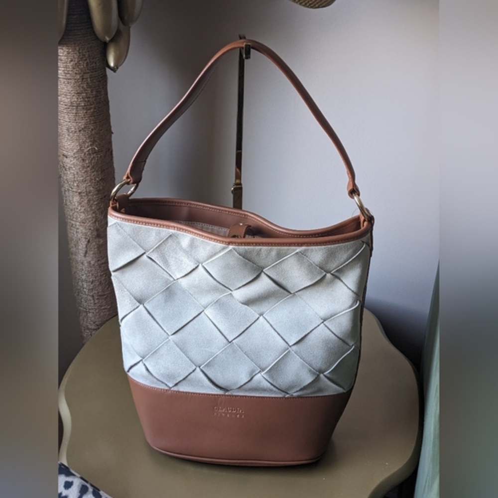 Claudia Firenze brown woven leather bucket bag.